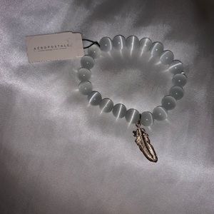 Pretty Bead and Feather Bracelet